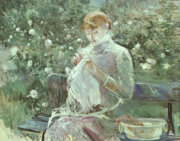 Jeune femme cousant dans un jardin Berthe Morisot Peintures à l'huile